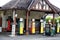 Garage near Colyford Devon England with vintage petrol pumps