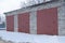 Garage stone old with red iron gates