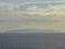 Garajau - Panoramic view of remote island Desert Grande seen from Cristo Rei in Garajau, Madeira island