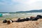 Garbage on beach, environmental pollution. black garbage bags on sand on an island in Asia. Garbage collection, cleaning of the