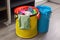 garbage bin with snap-in bag holder and color-coded bags