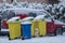 Garbage bins standing at the curbside