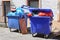 Garbage cans on the backyard of an old industrial building