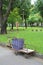 Garbage Cart with broom in the garden.