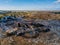 Garbage dump and working dump truck and bulldozer, aerial view