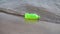 Garbage in the form of a plastic bottle floats in the river, lake close-up. Environmental pollution