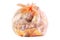 Garbage: Plastic bag with brown onionskin on a white background