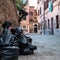 Garbage in plastic bags lying on the street