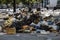 Garbage remains on the street at the site of the street market in the city of Milan.