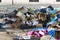 Garbage remains on the street at the site of the street market in the city of Milan.