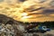 Garbage truck unloads construction waste from container at the landfill. Recycling waste concrete  and demolition material.