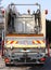 Garbage trucks during the solid waste collection service in the