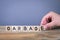 Garbage. Wooden letters on the office desk