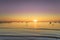 Garda lake, swans and jetty, sunset view from Pacengo Lazise. Italy