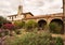 Garden and bell tower in San Juan Capistrano mission