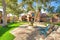 Garden bench near the small water fountain in the middle of residential buildings at Tucson, Arizona