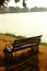 Garden bench on the rural lake shore