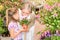 Garden center girl with grandmother smell flower