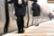 Garden City, New York - February 20, 2019 : Passengers boarding a Long Island Railroad LIRR train during a snow storm