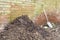 Garden compost heap with leaf mould, organic matter, UK