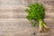 Garden dill on wooden background