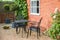 Garden furniture on gravel patio area, UK garden