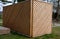 Garden gazebo, pavilion or toilets in the park made of modern wood paneling building envelope the size of a construction container