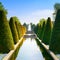 Garden in Keukenhof, conical hedges lines, water pool and fountain. Netherlands