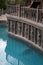 Garden lounge pool with stone sculptures and pilasters