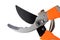 Garden metal pruner with plastic orange handles, insulated on a white background