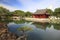 Garden in Montreal and Chinese architecture reflected on the lake