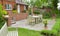 Garden patio in landscaped back garden outside UK home