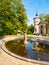 Garden pond with small statue at Orangerie of Sychrov Castle, Czech Republic