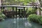 Garden with pool and covered bridge