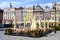 Garden restaurant on the Stary Rynek Town Square with Tyskie brewery umbrellas in Poznan, Poland