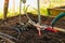 Garden season prep in raised bed with tools and compost.