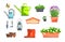 Garden set of lavender, strawberry in pots, watering can, red rubber boots, lamp, wooden sing and tools for gardening