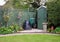 Garden Shed in an English Garden with compost bin