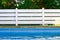 Garden swimming pool site space fenced by wooden deck palisade object suburban villa yard outside simple background picture