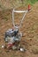 Garden tiller for field cultivating.