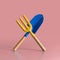 Garden tool. Blue blade and a yellow fork on pink background