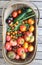 Garden trug harvest basket with homegrown vegetables, tomatoes,