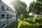 Garden view with trees and hotel in summer resort (Zakynthos, Greece)