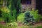 Garden view with various conifers and perennials