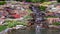 Garden waterfall on the rock