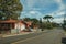 Gardened houses and trees on street of Gramado