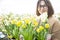 Gardener with daffodils