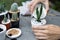 Gardener decorating a small cactus In pots, Close-up