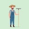 Gardener holding rake country man working in garden gardening eco farming concept full length