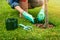 gardener install plastic grass edge around the tree